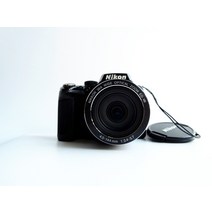 36x nikkor 광각 광학 줌 렌즈와 풀 HD 1080p 비디오검은색가 장착된 니콘 쿨픽스 p500 12.1 cmos 디지털 카메라를 사용했습니다.