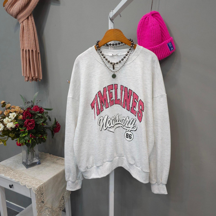 여성용 빈티지 타임라인 오버핏 라운드넥 긴팔 맨투맨